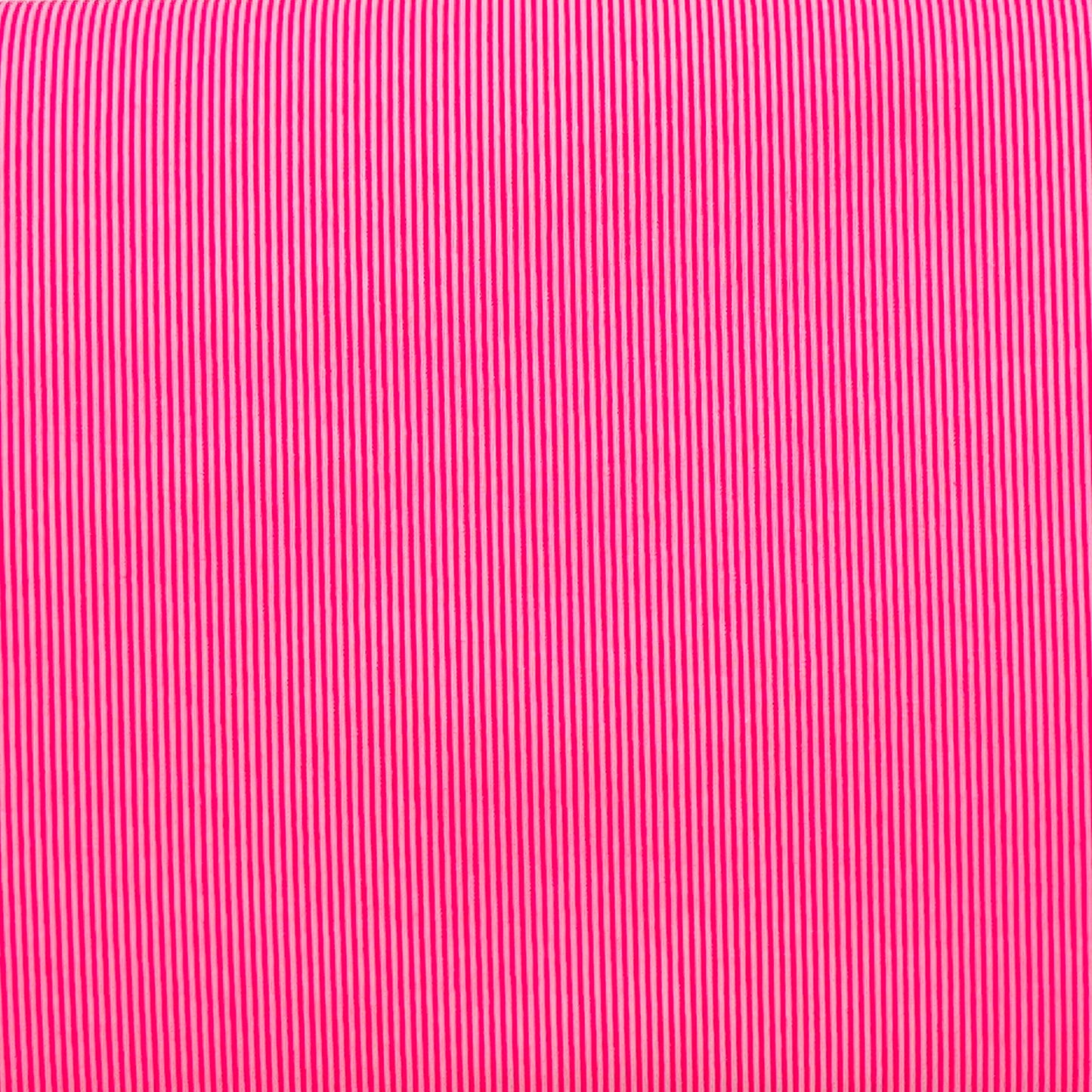 Tessuto millerighe rosa fluo e bianco