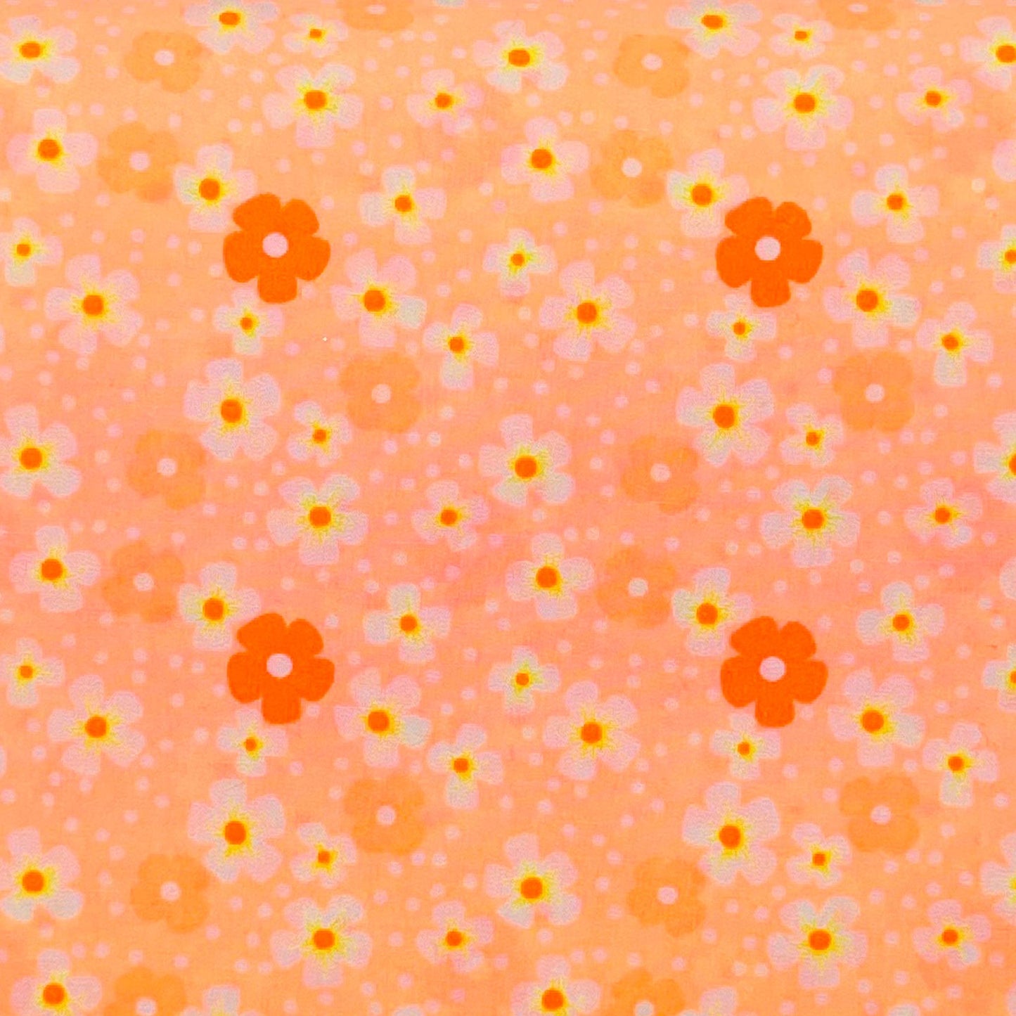 Tessuto con fiorellini su base rosa salmone