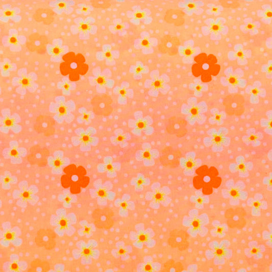 Tessuto con fiorellini su base rosa salmone