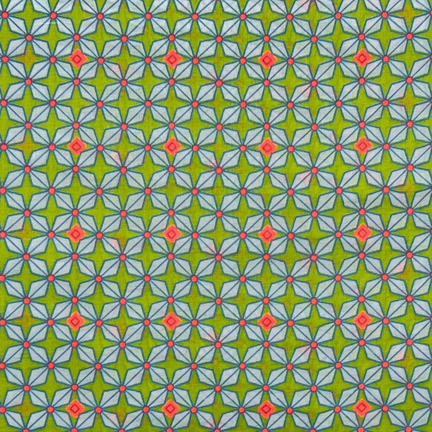 Tessuto fantasia geometrica su fondo verde acido
