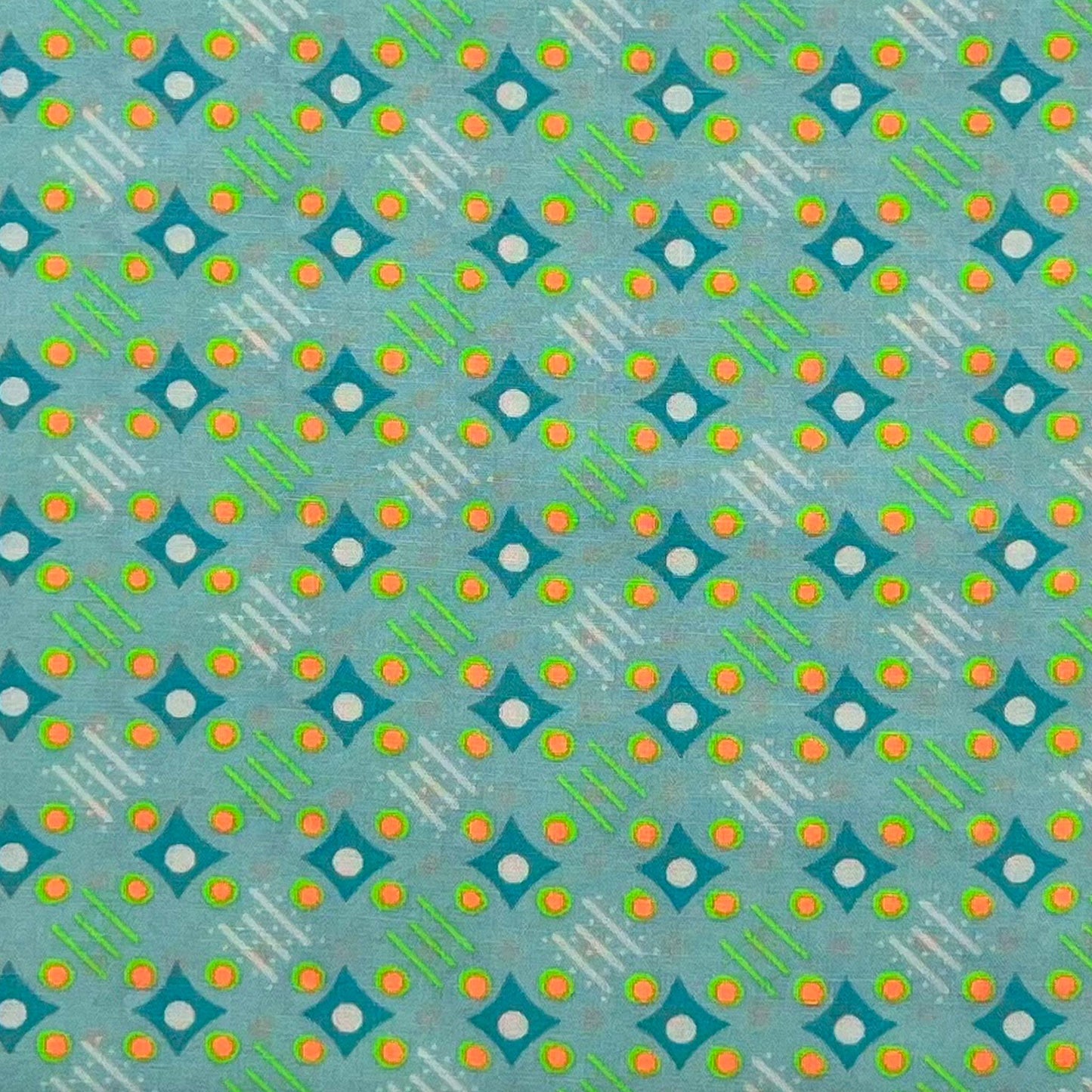 Tessuto fantasia geometrica su fondo verde chiaro