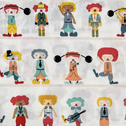 Tessuto fantasia con clown su fondo panna