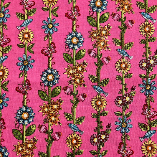 Tessuto a fantasia con ghirlande di fiori verticali su fondo fucsia