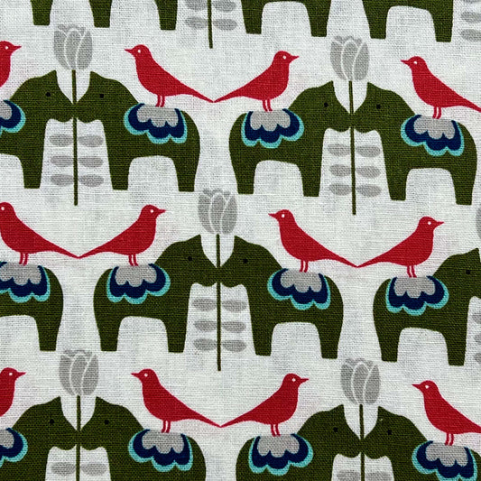 Tessuto a fantasia geometrica con animali su fondo neutro