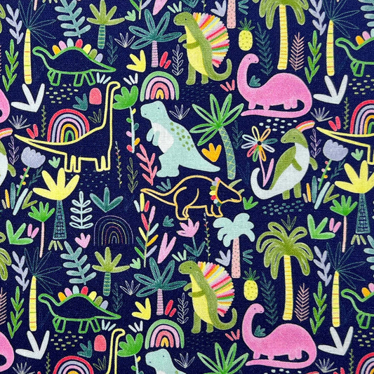 Tessuto a fantasia con dinosauri su fondo blu