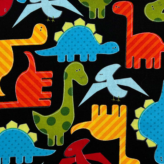 Tessuto a fantasia con dinosauri colorati su fondo nero