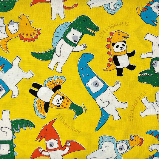 Tessuto a fantasia con animali su fondo giallo