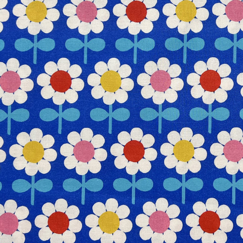 Tessuto a fantasia con fiori su sfondo azzurro