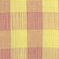 Tessuto in mussola vichy a quadrettoni giallo chiaro e rosa