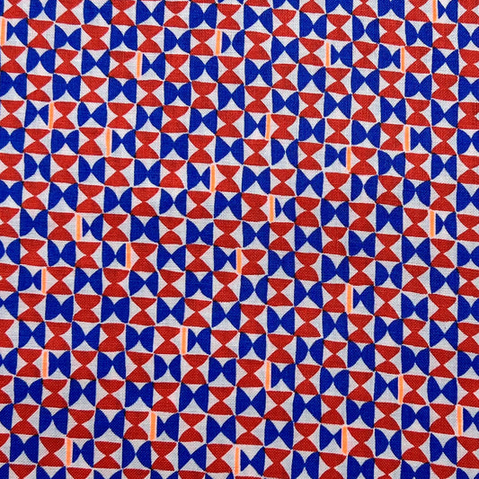 Tessuto a fantasia geometrica rosso e blu