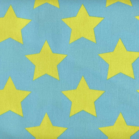 Tessuto a fantasia con stelle su sfondo azzurro